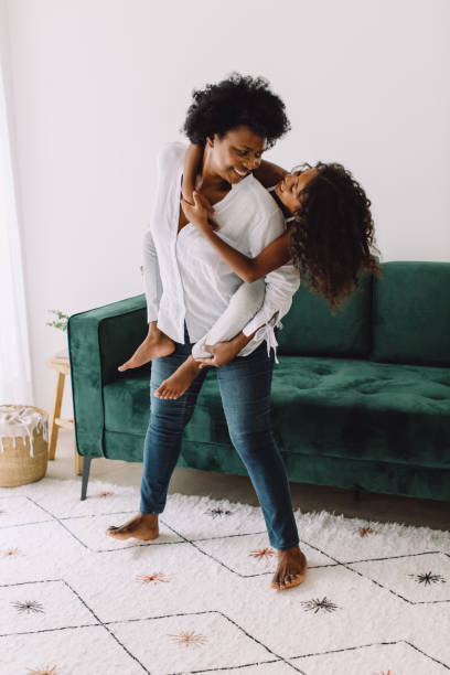 istock Grandmother dancing with her granddaughter on her back 1326047661