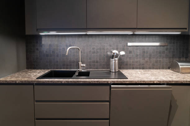 istock Wood table top on blur kitchen room 1326049894