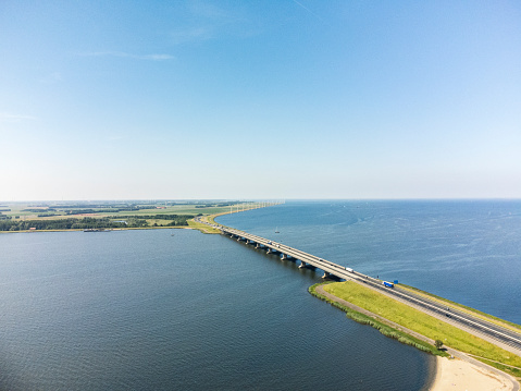 Ketelbrug overhead drone view with the A6 highway. The bridge is located between the Ketelmeer and Ijsselmeer in Flevoland, The Netherlands