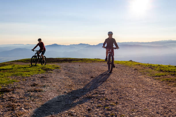 istock Cycling uphill with mountain bike 1326054554