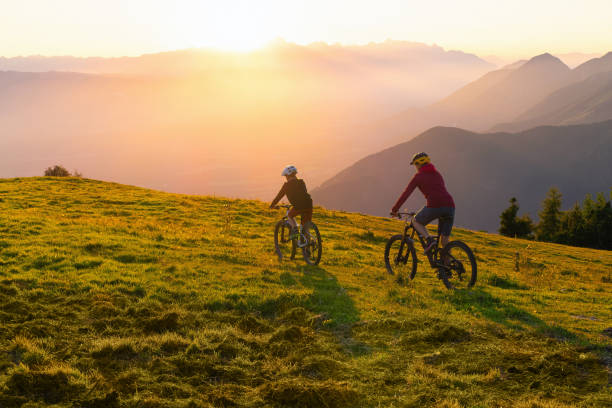 istock Cycling uphill with mountain bike 1326054563