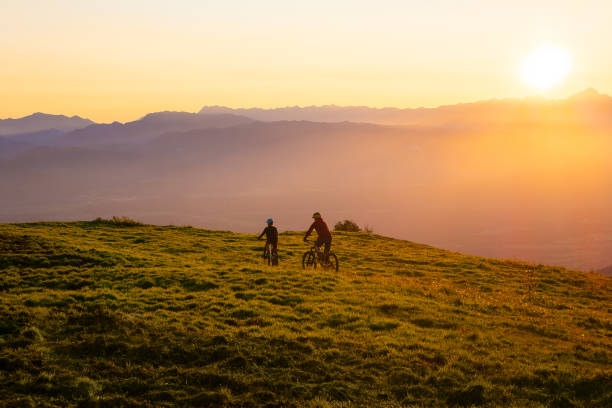 istock Cycling uphill with mountain bike 1326054588