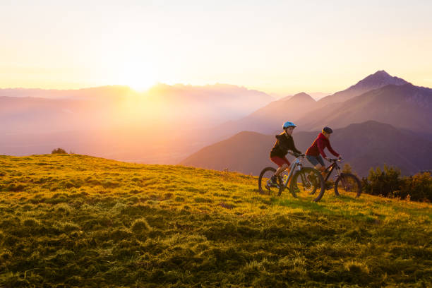 istock Cycling uphill with mountain bike 1326054599