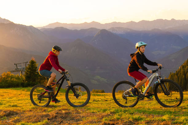 istock Cycling uphill with mountain bike 1326054610