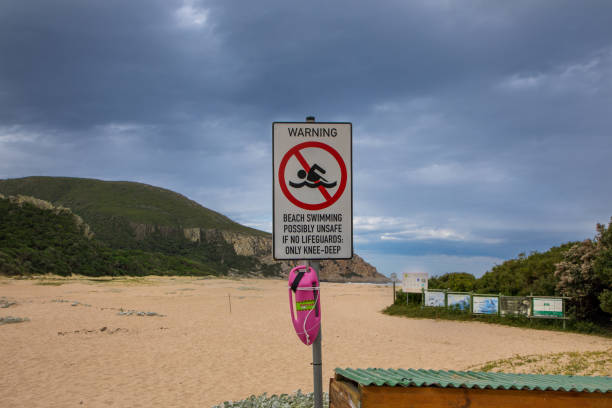 istock Sign indicating that swimming at a beach is unsafe 1326058284