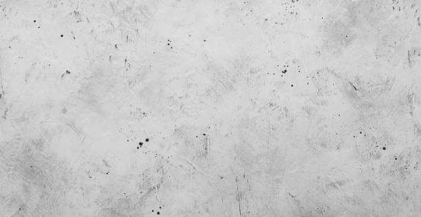 istock Gray backdrop with blur effect, picture of gray concrete wall with black dots on surface, template and graphic resource. 1326059087