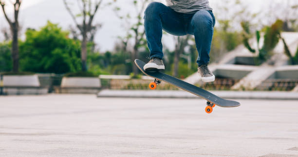istock Skateboarder legs skateboarding at outdoors 1326060193
