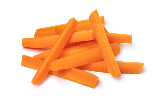 Heap of fresh raw healthy carrot sticks as a snack isolated on white background