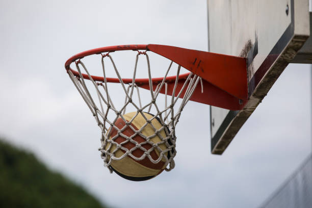 istock Basketball in the Hoop 1326064800