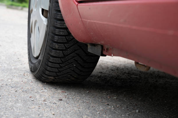 istock Red car wheel, close up 1326068813