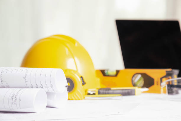 istock Work safety. Standard Construction site protective equipment on table wooden background, flat lay, copy space,safety first concepts. 1326070193