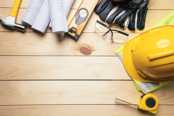 istock Work safety. Standard Construction site protective equipment on  top view wooden background, flat lay, copy space,safety first concepts. 1326070202