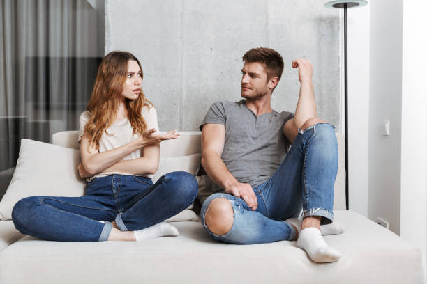 istock Offended displeased young loving couple 1326070397