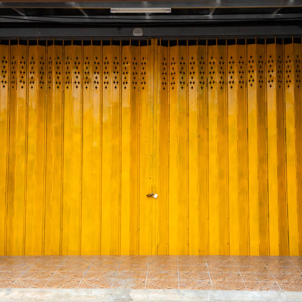 istock The folding yellow iron door was locked. 1326071261