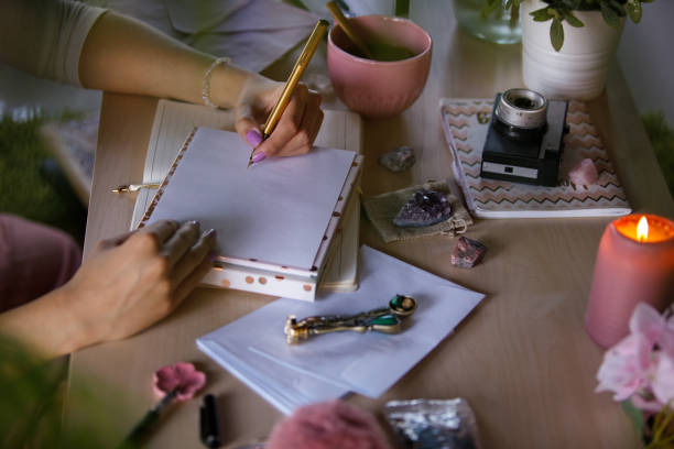 istock Unrecognizable young woman writing a letter 1326071388