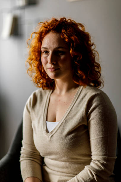 istock Beautiful young redhead smiling and contemplating 1326071832