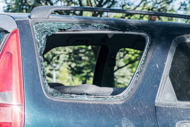 istock Broken side window in the car. Criminal incident. 1326072928