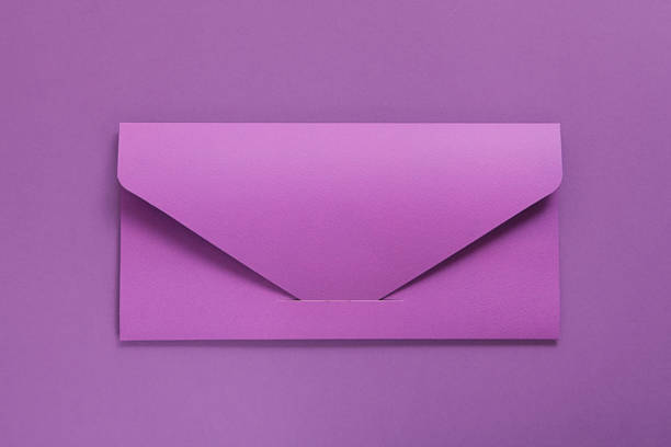 Violet Blank envelope on violet background. Template for branding identity. Top view.