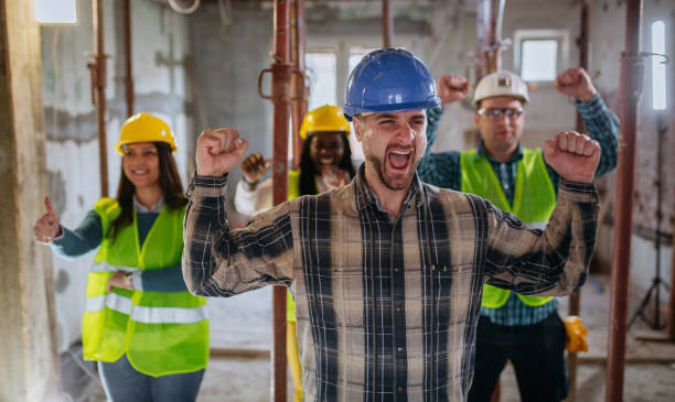 istock Happy architects are renovating the house 1326079047