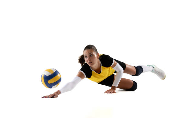istock Female professional volleyball player with ball isolated on white studio background. The athlete, exercise, action, sport, healthy lifestyle, training, fitness concept. 1326082143