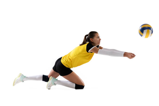 istock Female professional volleyball player with ball isolated on white studio background. The athlete, exercise, action, sport, healthy lifestyle, training, fitness concept. 1326082144