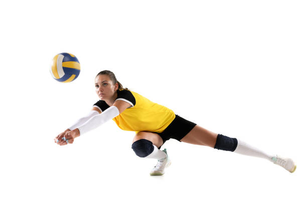 istock Female professional volleyball player with ball isolated on white studio background. The athlete, exercise, action, sport, healthy lifestyle, training, fitness concept. 1326082147