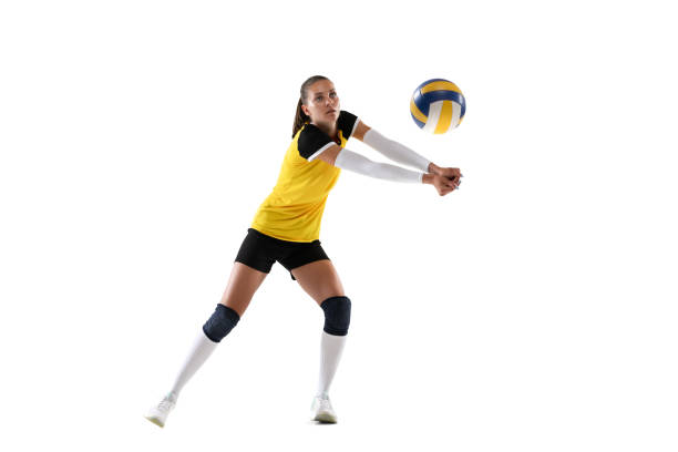 istock Female professional volleyball player with ball isolated on white studio background. The athlete, exercise, action, sport, healthy lifestyle, training, fitness concept. 1326082155