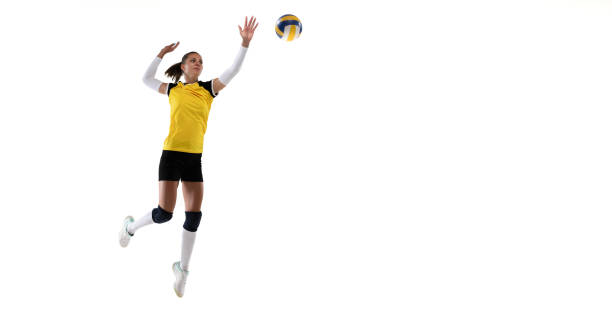 istock Female professional volleyball player with ball isolated on white studio background. The athlete, exercise, action, sport, healthy lifestyle, training, fitness concept. 1326082190