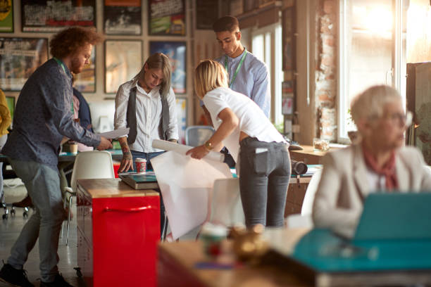 istock Group of young creative people in a teamwork at office. Employees, office, work 1326085538