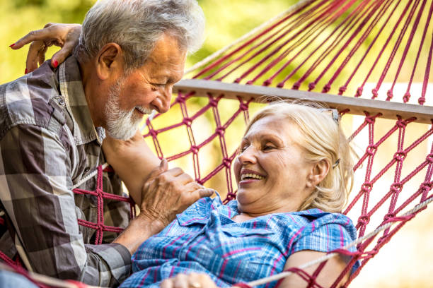 istock Senior couple on vacation in hammock 1326087470