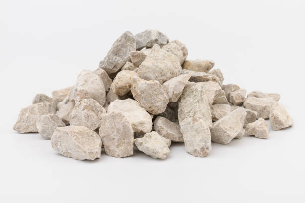 istock Gray small rocks ground texture isolated on white background. Small road stone. 1326088677