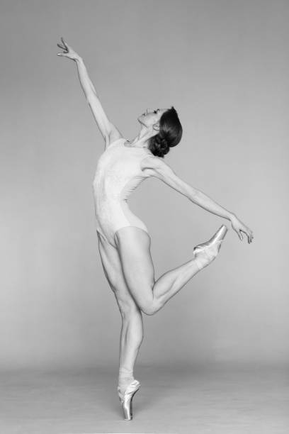 istock Young beautiful skinny ballerina is posing in studio 1326089088