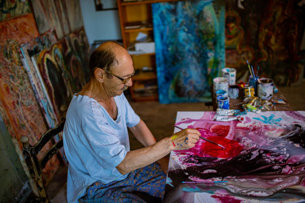 istock Messy senior hipster artist 1326089439