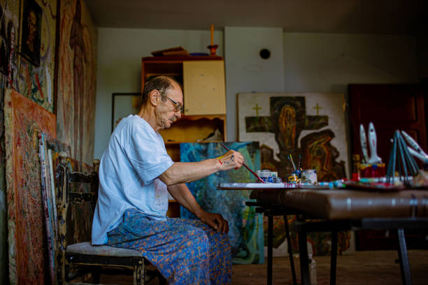 istock Oil painting is his specialty 1326089529