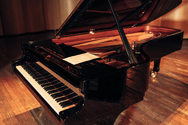 istock Beautiful piano in concert hall 1326090331