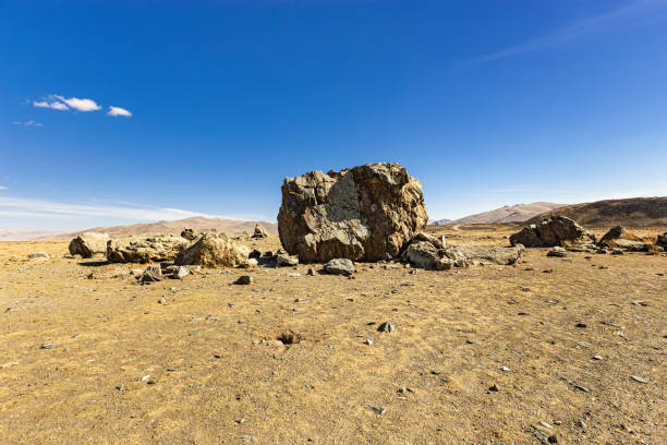 istock Tarkhatinsky megalithic complex consists of stone blocks. Archaeological monument in Chui steppe, Altai Republic, Russia 1326091060