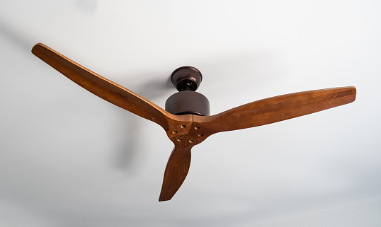 Wall mounted fan on garage wall