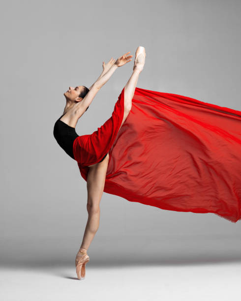 istock Young beautiful skinny ballerina is posing in studio 1326092695