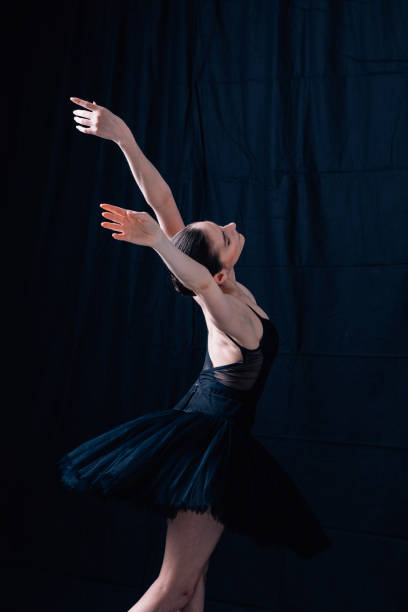 istock Young beautiful skinny ballerina is posing in studio 1326092874