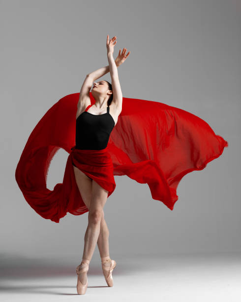 istock Young beautiful skinny ballerina is posing in studio 1326092927