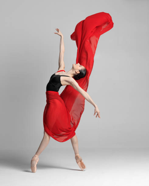 istock Young beautiful skinny ballerina is posing in studio 1326093161