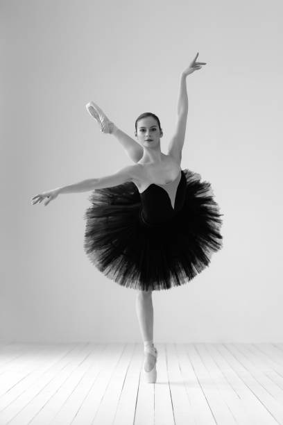 istock Young beautiful skinny ballerina is posing in studio 1326093207