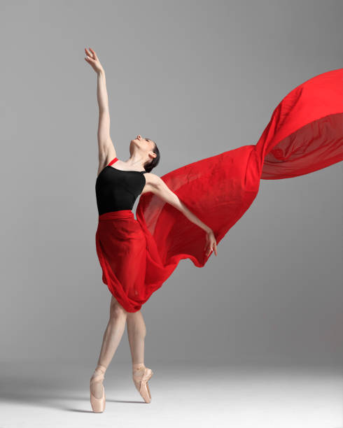 istock Young beautiful skinny ballerina is posing in studio 1326093348