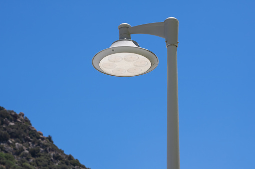 lighting pole in blue sky