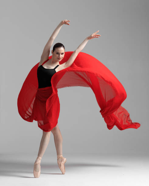istock Young beautiful skinny ballerina is posing in studio 1326094351