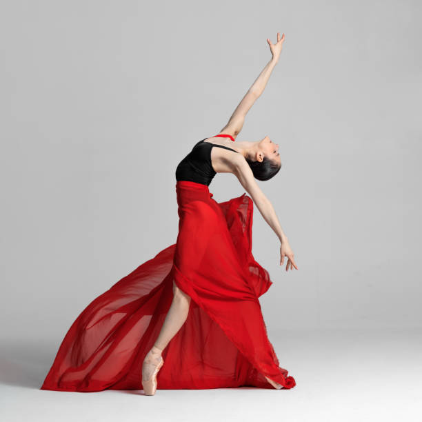 istock Young beautiful skinny ballerina is posing in studio 1326094521