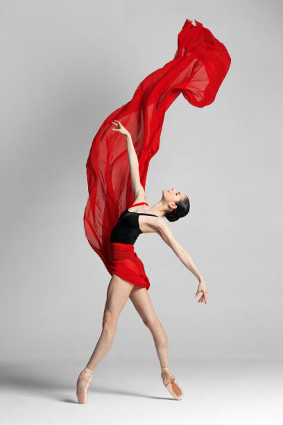 istock Young beautiful skinny ballerina is posing in studio 1326094878