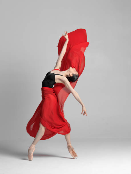 istock Young beautiful skinny ballerina is posing in studio 1326096272