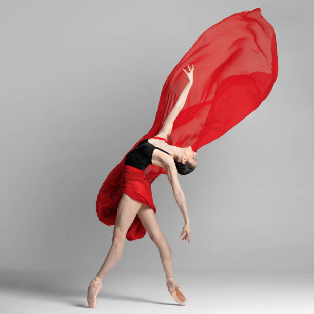 istock Young beautiful skinny ballerina is posing in studio 1326096348