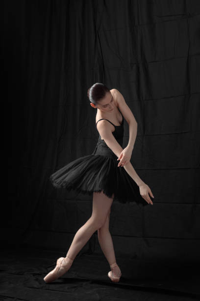 istock Young beautiful skinny ballerina is posing in studio 1326096358